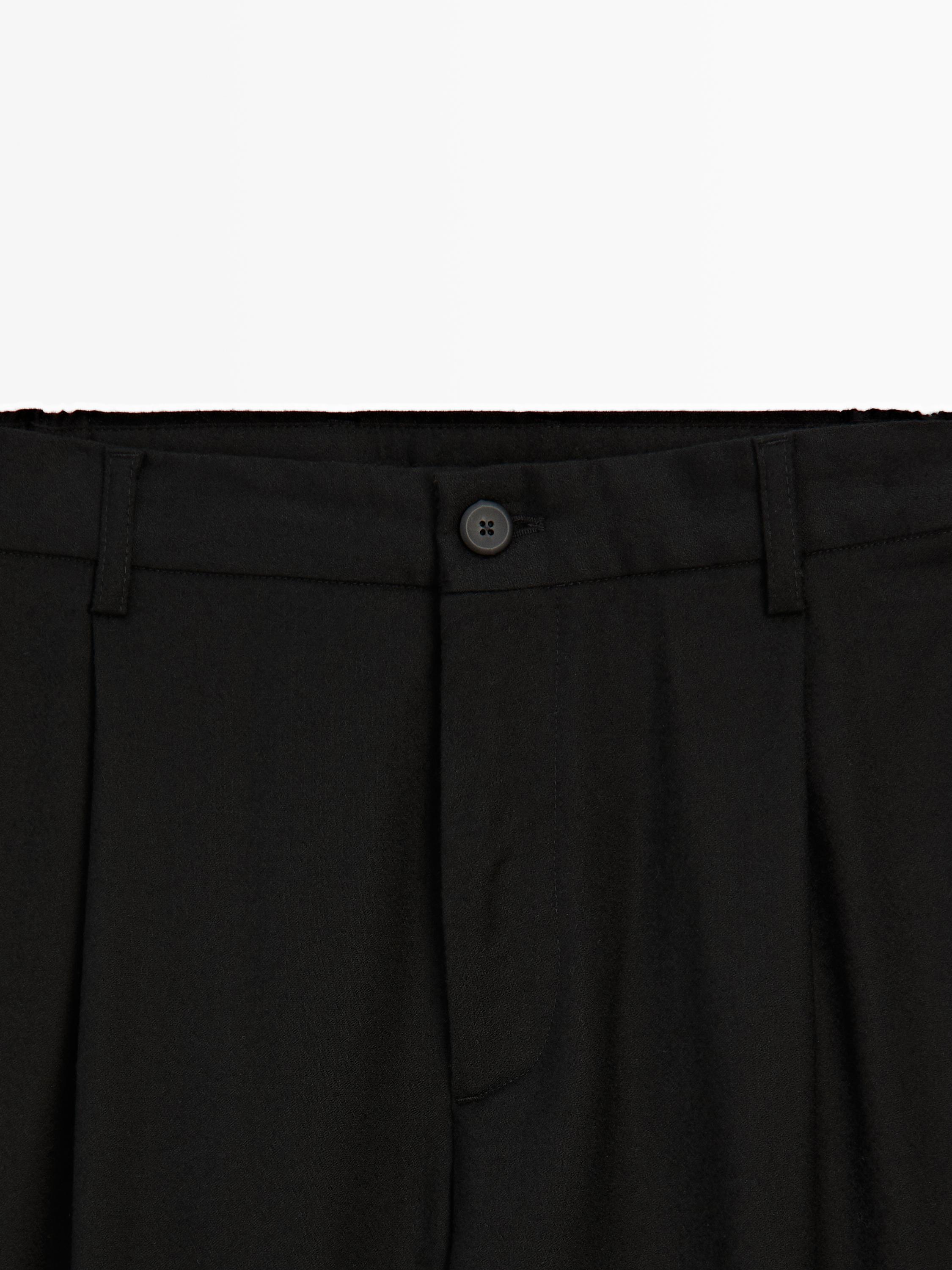 Pantalon à pinces relaxed fit en laine mélangée